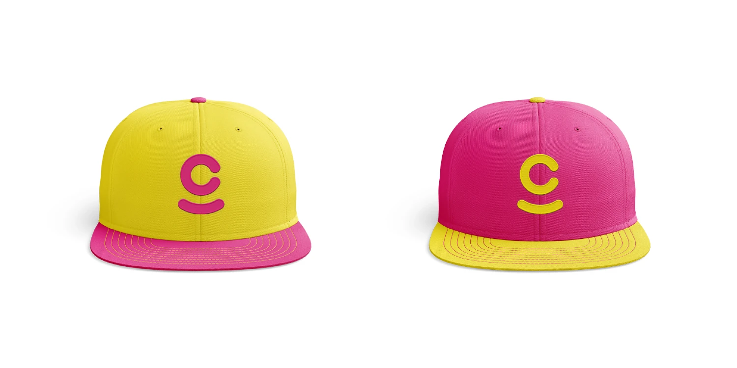 Yellow and pink Cure Injoy C-mark caps