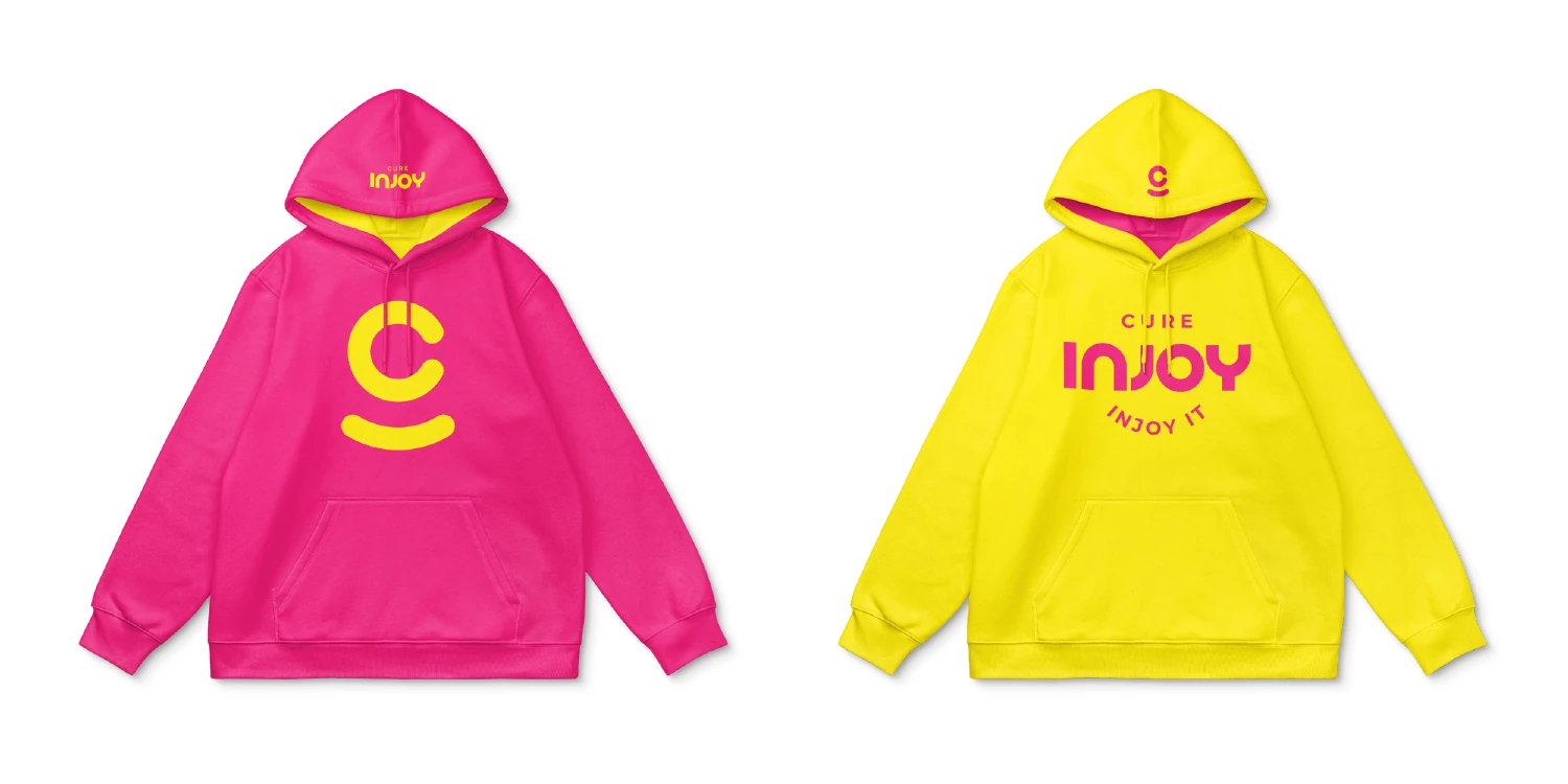 Pink and yellow Cure Injoy logo hoodies